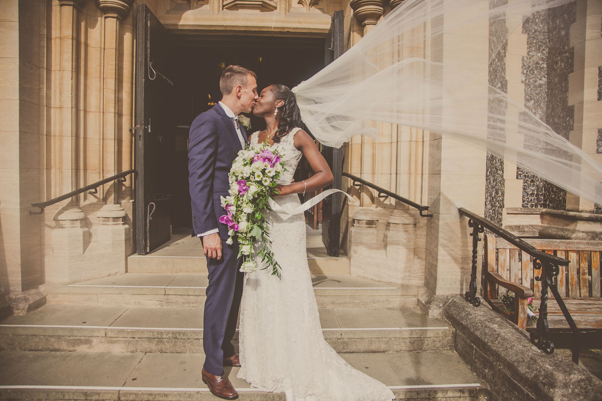 london wetland centre wedding, bride and groom kissing, Wedding photographers London